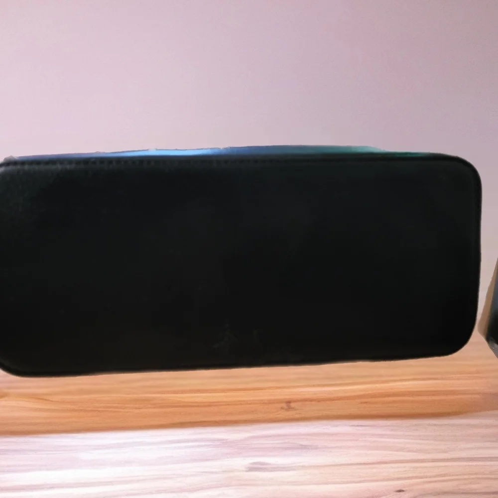 Elegant Black and Cream Handbag